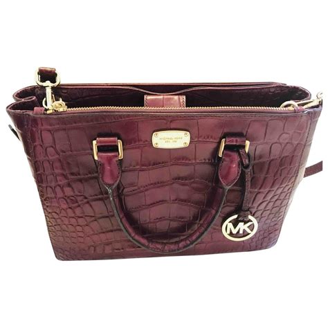 michael kors burgundy purse|More.